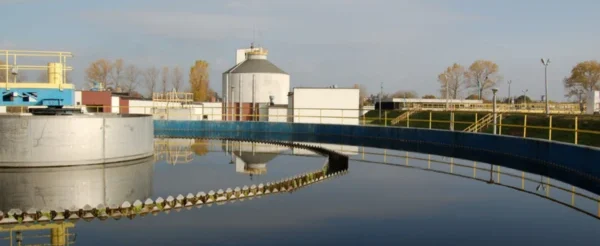 Industrial wastewater treatment plant with treatment tanks and clarifiers