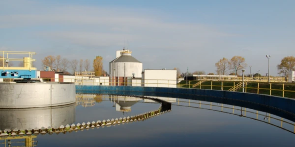 Industrial wastewater treatment plant with treatment tanks and clarifiers
